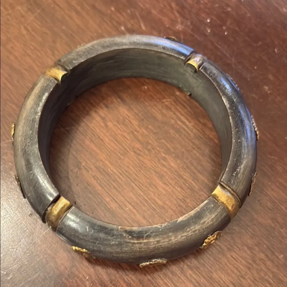 Black and Gold Bracelet with Unique Embedded Flowers
